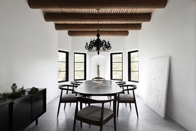 A modern dining room with Marvin Ultimate Casement Narrow Frame Windows