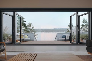 Room outlooking water with new Marvin Elevate Bi-Fold Door