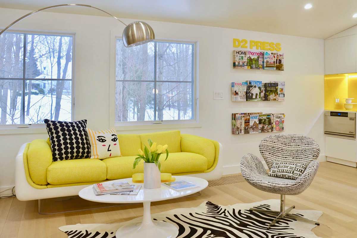 Designer Denise Davies' living room with yello sofa
