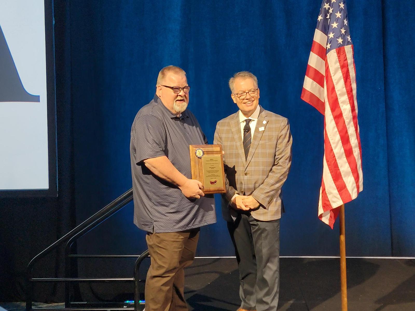 Bob Simmons receiving the Occupational Safety and Health Administration (OSHA) Special Government Employee of the Year Award