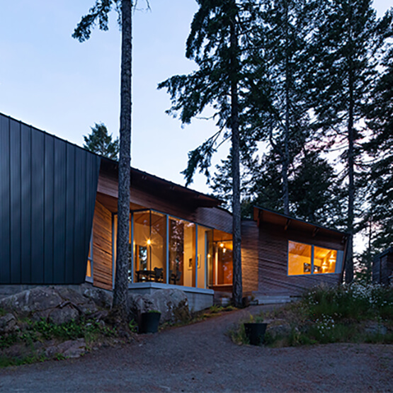 Home in the woods with Marvin Windows and Doors