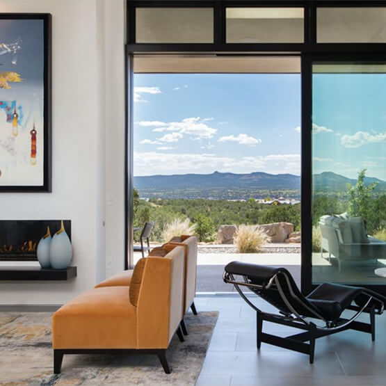 Santa Fe, Arizona home with mountain views seen through large Marvin Windows