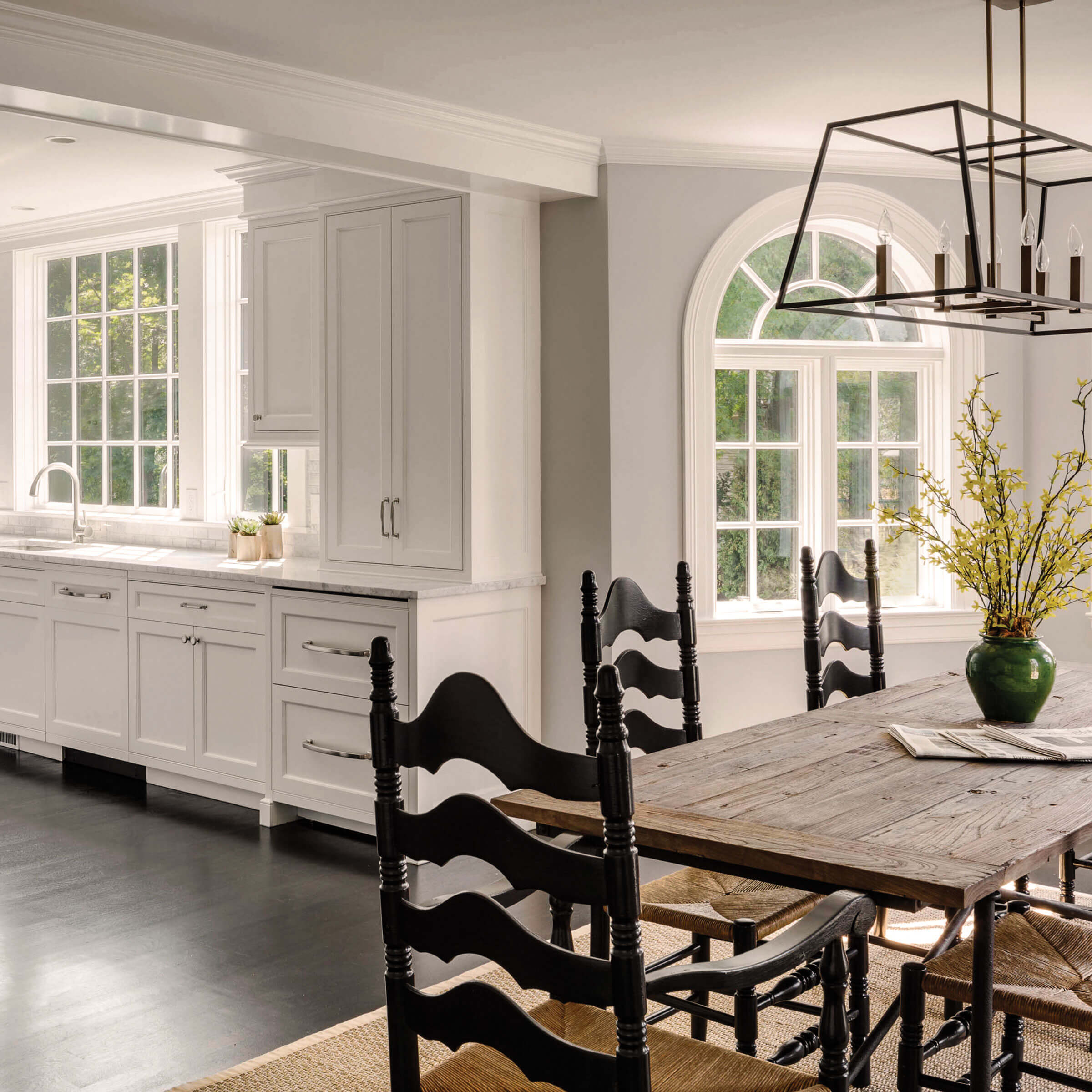 Spacious White Kitchen With Marvin Elevate Round Top Windows 