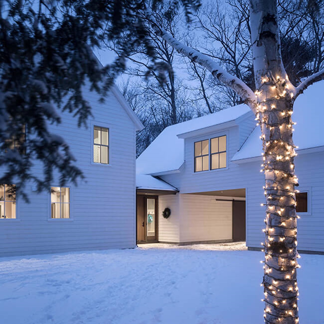 Beautiful Snowy Scene Of Home With Elevate Windows And Doors