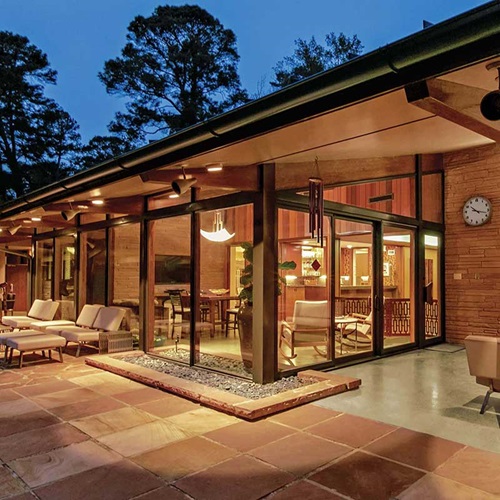 Exterior View Of Home With Ultimate Swinging French Door