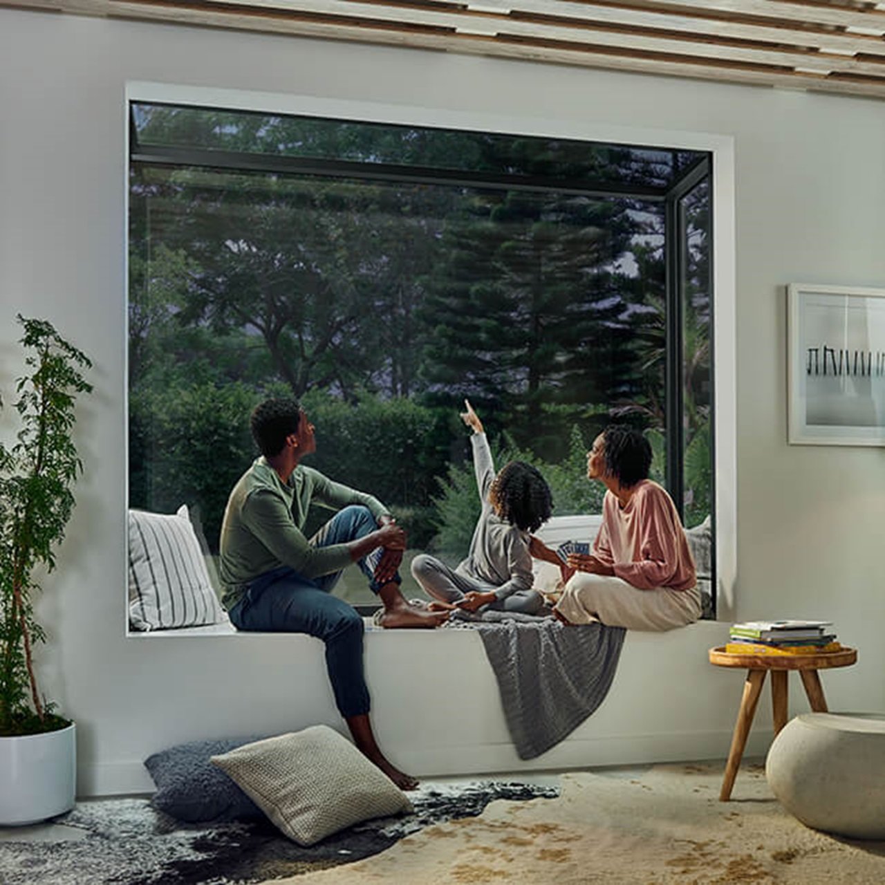 Interior of home with family sitting in Marvin Skycove window box