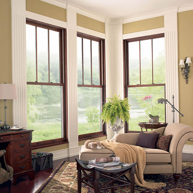 Living Room With Signature Ultimate Wood Double Hung Magnum Windows