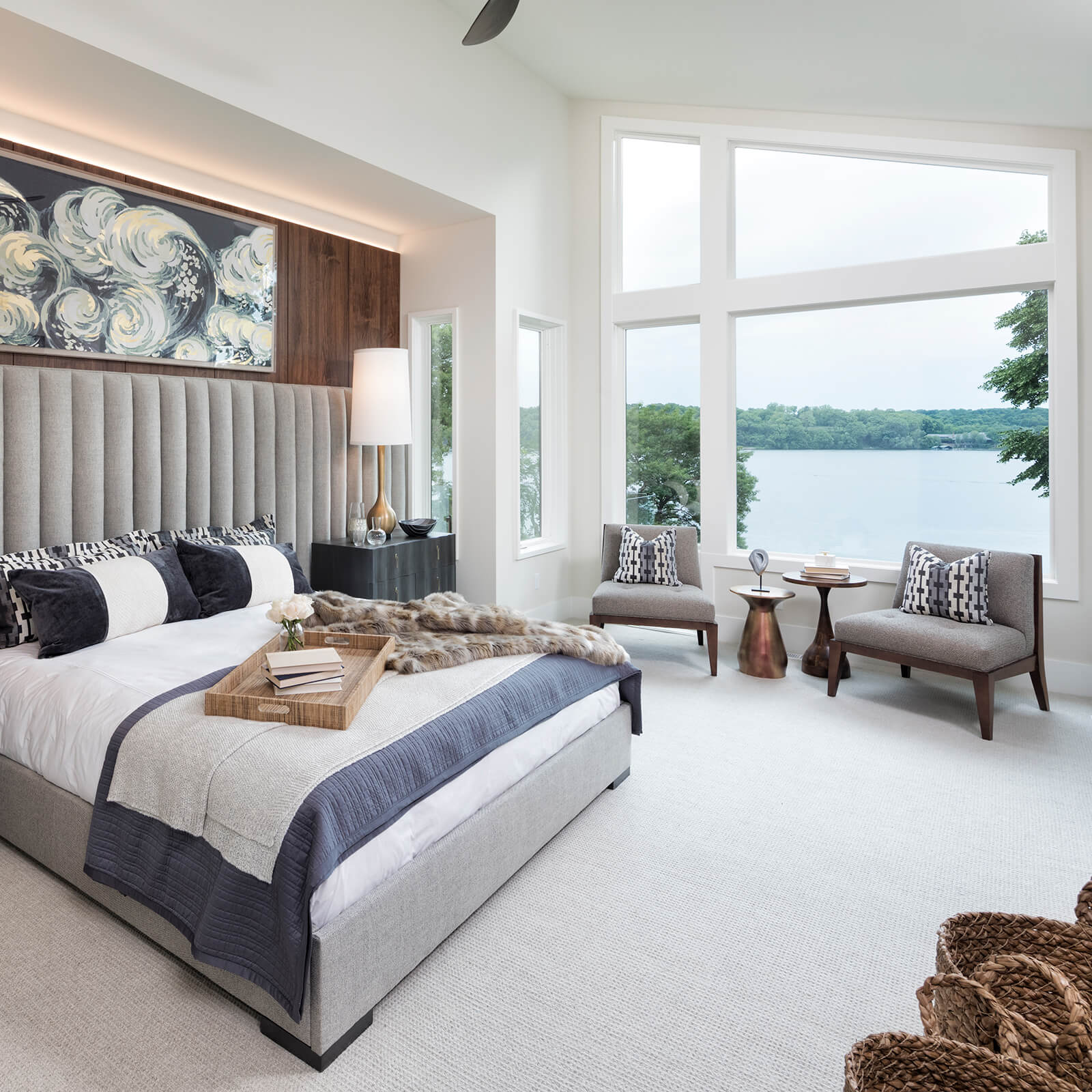 Lakefront bedroom with Marvin Elevate Casement Windows, Elevate Picture Windows and Elevate Specialty Shapes Windows