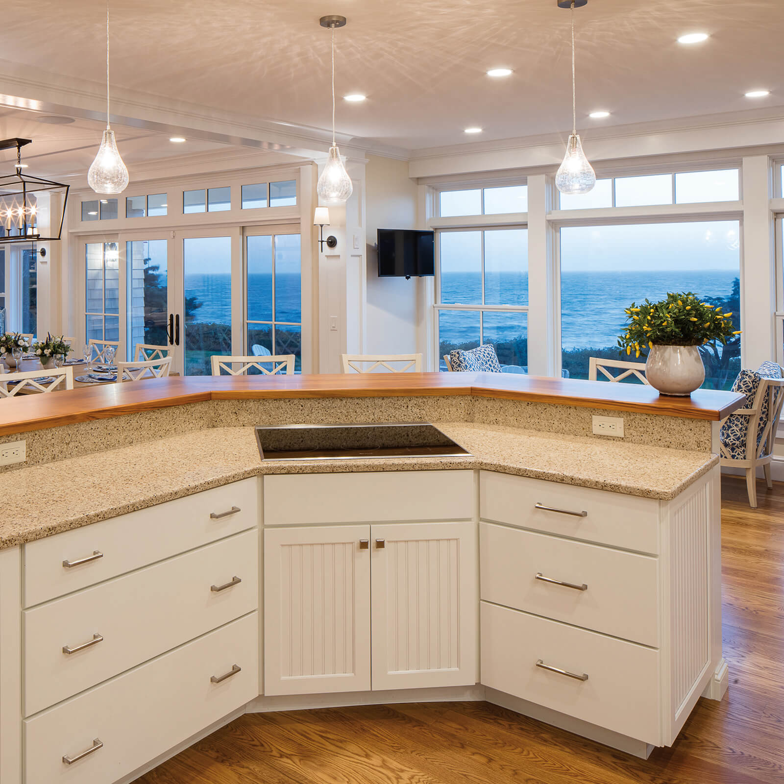 Kitchen view of waterfront home with Marvin Elevate Double Hung Windows and Elevate Sliding French Door