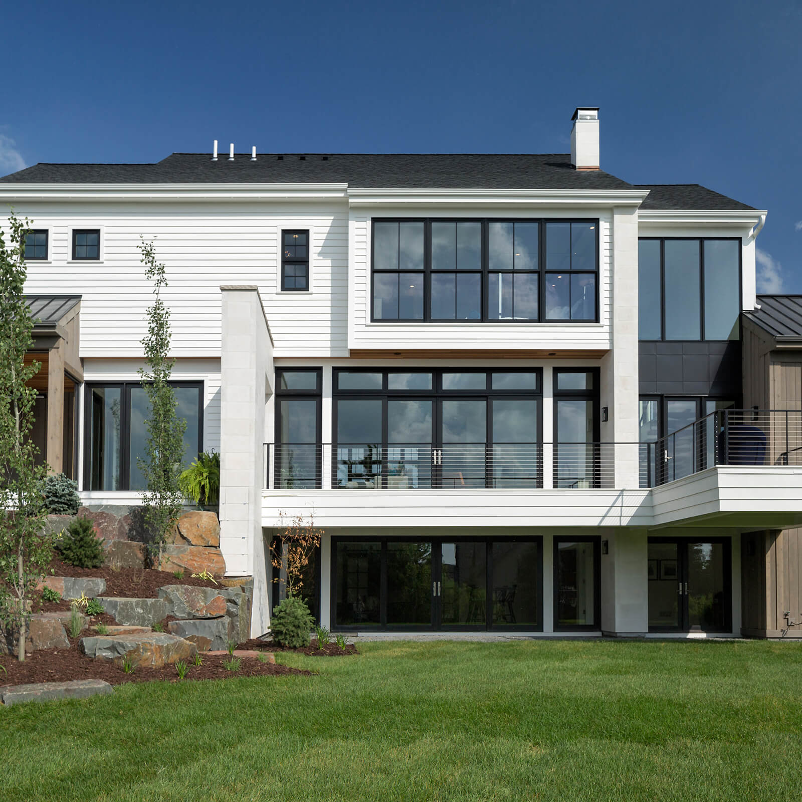 Closeup exterior view of modern style home with Marvin Signature Ultimate Casement Windows