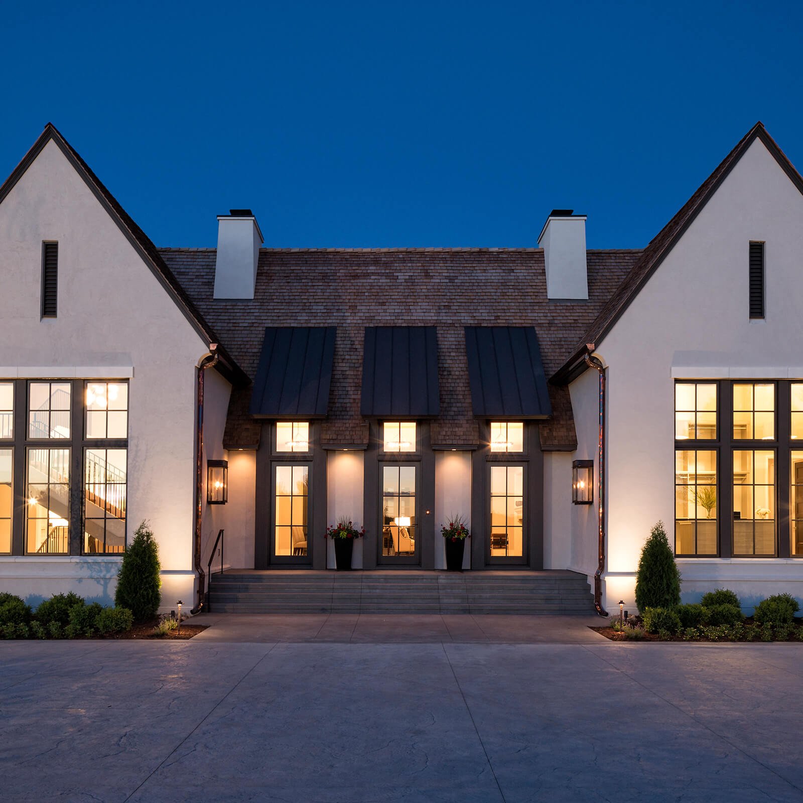 Modern style home with Marvin Signature Ultimate Inswing French Door and Ultimate Casement Windows