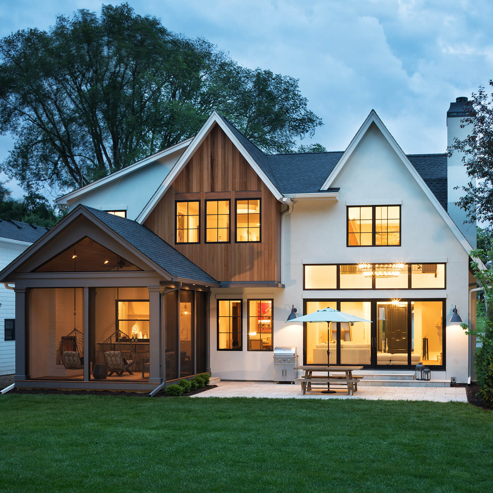 Exterior view of a modern traditional style home with Marvin Elevate Sliding French Door and Elevate Casement Windows