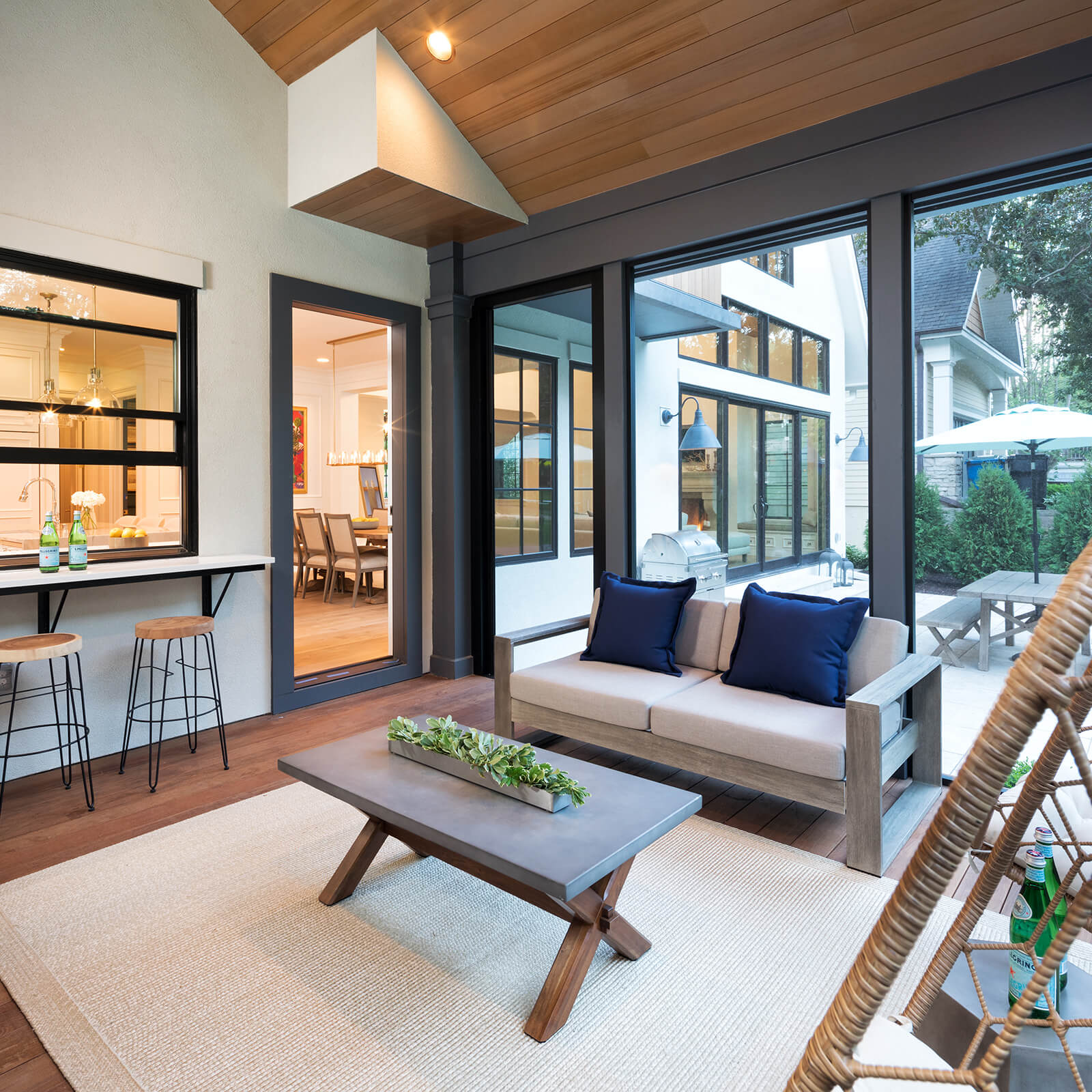 Large indoor outdoor living area with Marvin Elevate Sliding French Door and Elevate Casement Windows