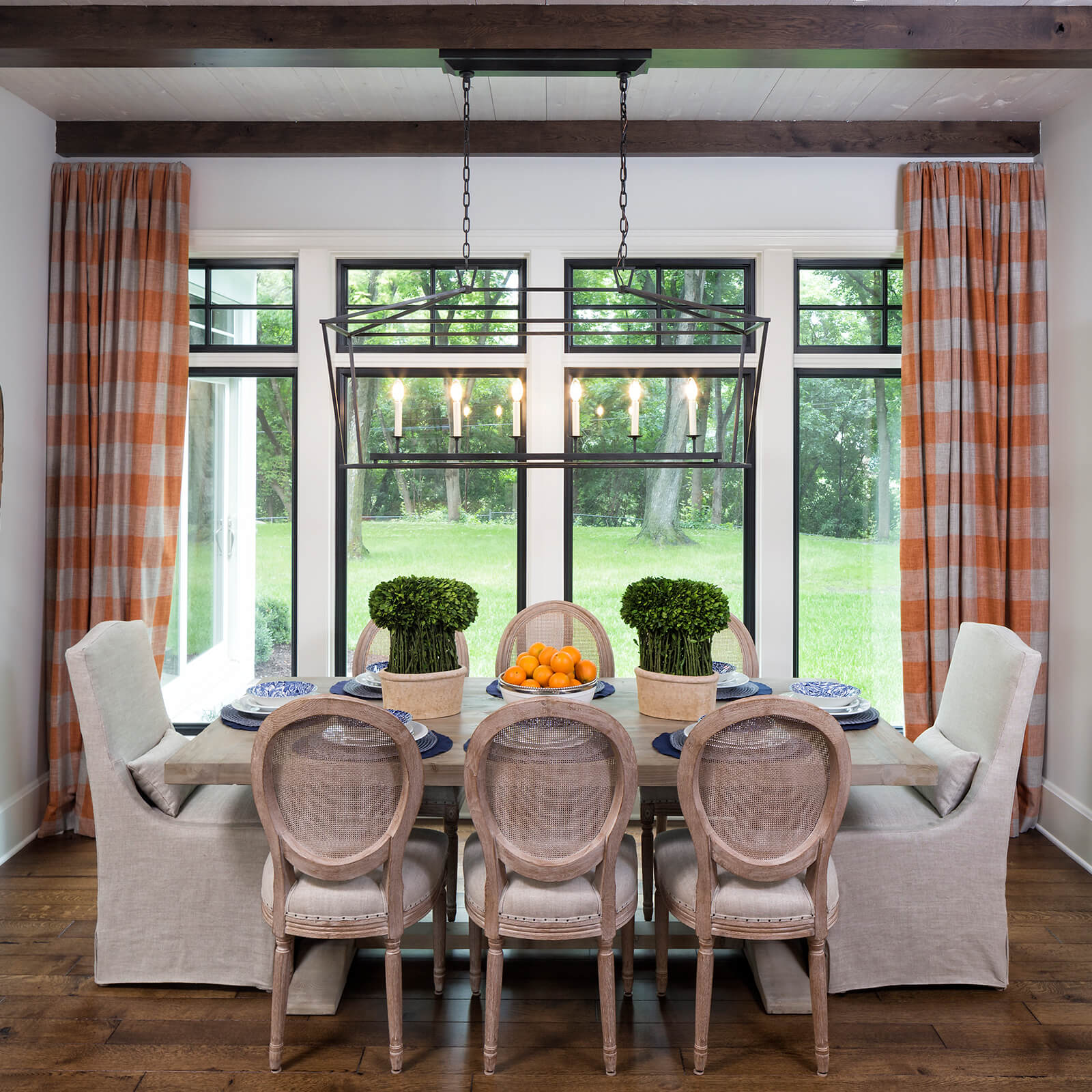 Dining room with Marvin Signature Ultimate Casement Windows