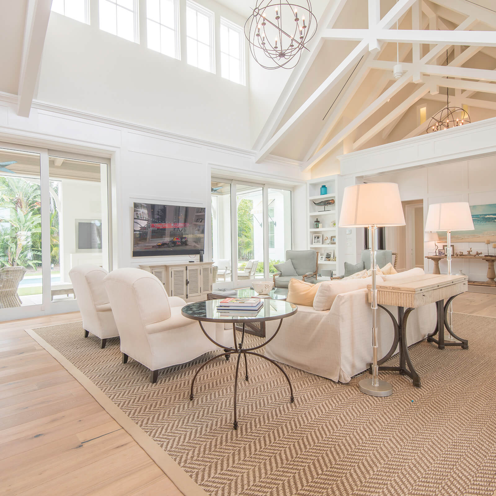 Large open concept living room with vaulted ceilings and Marvin Elevate Casement Windows