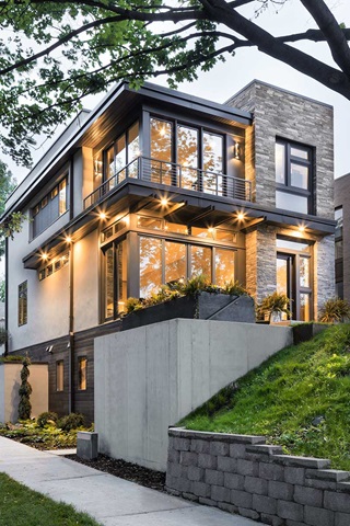 Exterior of home with Marvin Elevate Casement windows and Sliding Patio Door