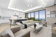 Open concept living room with Marvin Signature Coastline Multi-Slide Door