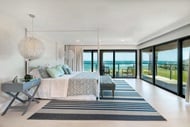 Modern style bedroom with Marvin Signature Coastline Multi-Slide Door