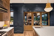 Kitchen with Marvin Signature Ultimate Bi-Fold Door and Marvin Signature Ultimate Casement windows