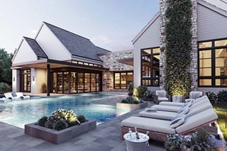 Poolside Exterior View Of Large Home With Signature Ultimate Multi-Slide Door