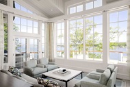 Living room with Marvin Signature Ultimate Picture windows and Inswing French Door