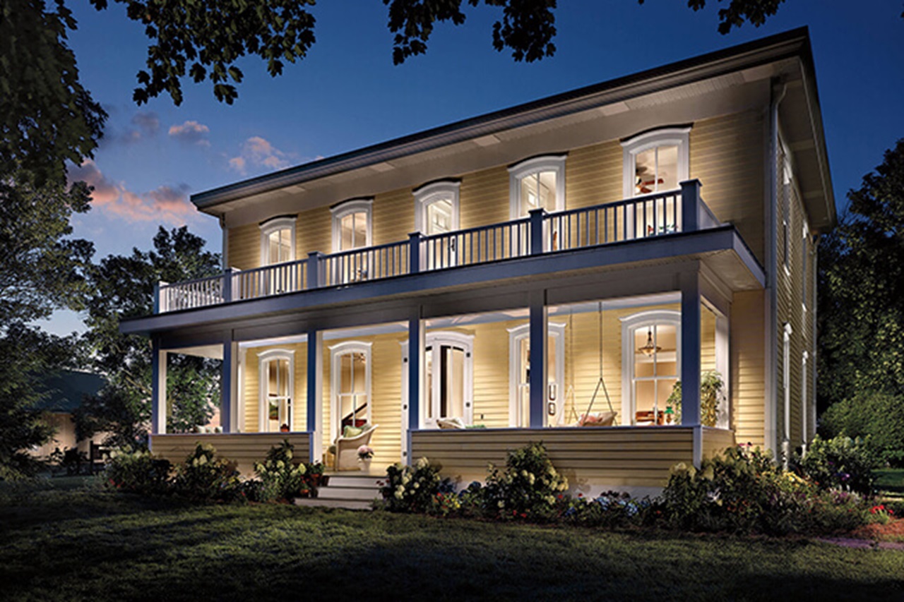 Exterior View Of Brightly Lit House With Signature Ultimate Wood Double Hung Windows