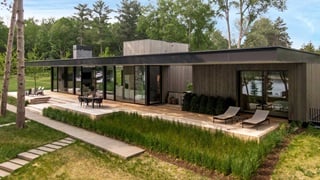 Marvin Signature Modern Multi Slide Door with a Direct Glaze window featured on a deck