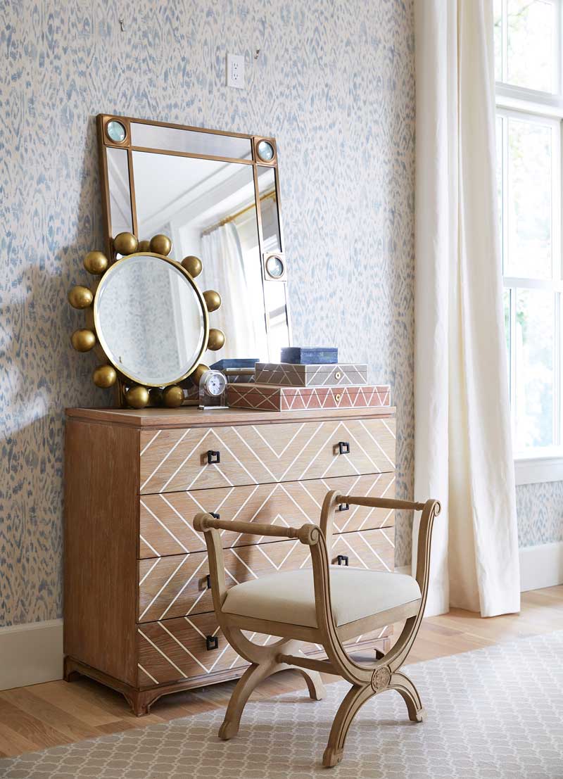 A dresser with two mirrors on top in a bedroom in the House Beautiful Whole Home 2018 in Atlanta, Georgia, featuring an Ultimate Double Hung window.