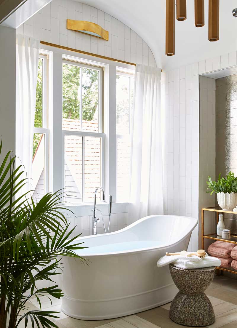 A contemporary bathroom in the House Beautiful Whole Home 2018 in Atlanta, Georgia, featuring Marvin Ultimate Double Hung G2 windows. 