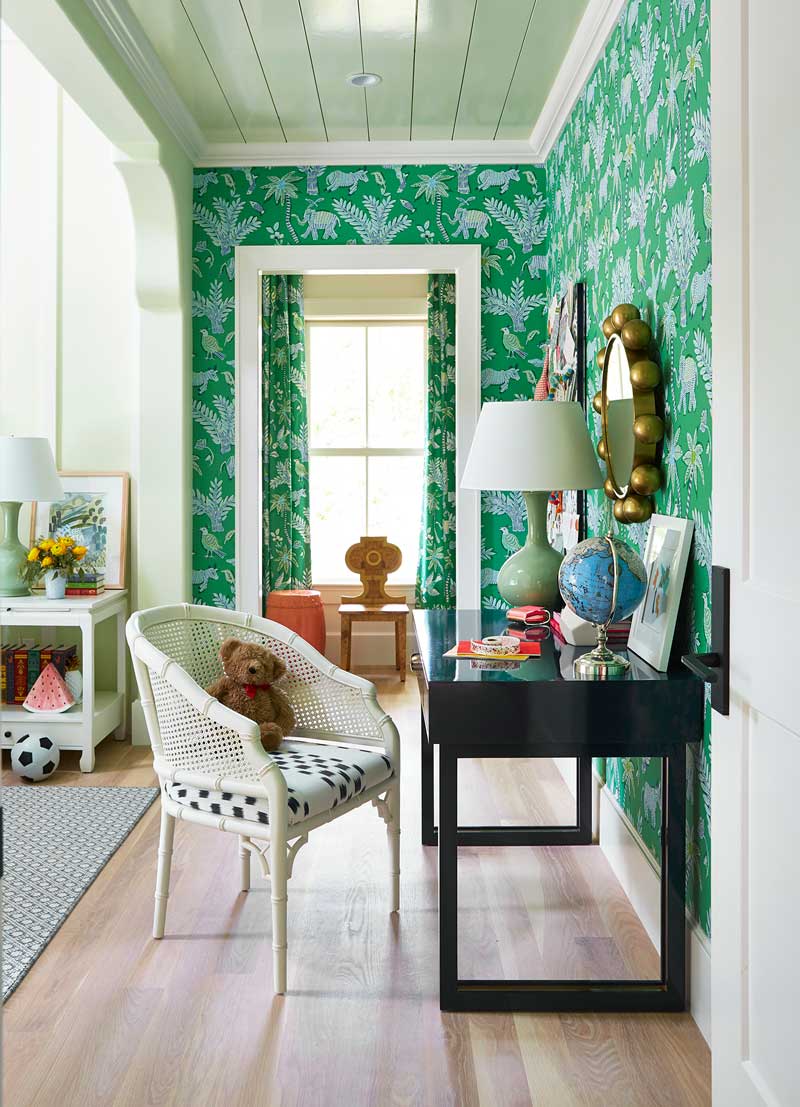 A child’s bedroom in the House Beautiful Whole Home 2018 in Atlanta, Georgia, featuring green wallpaper and Marvin Ultimate Double Hung G2 windows.