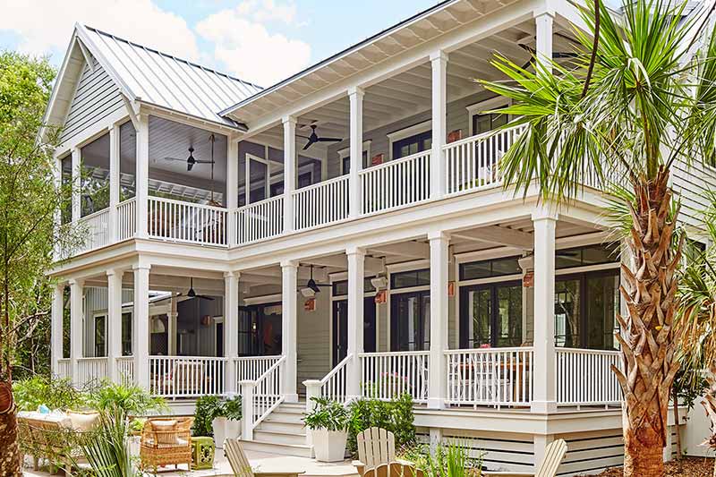 Exterior shot of back porches and patios on Bald Head Island Vacation Home