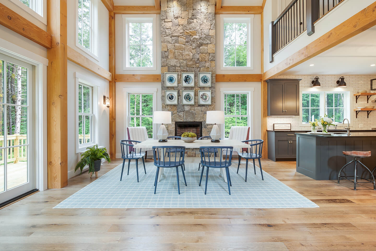 Open concept living room and kitchen in a farmhouse cottage-style home.
