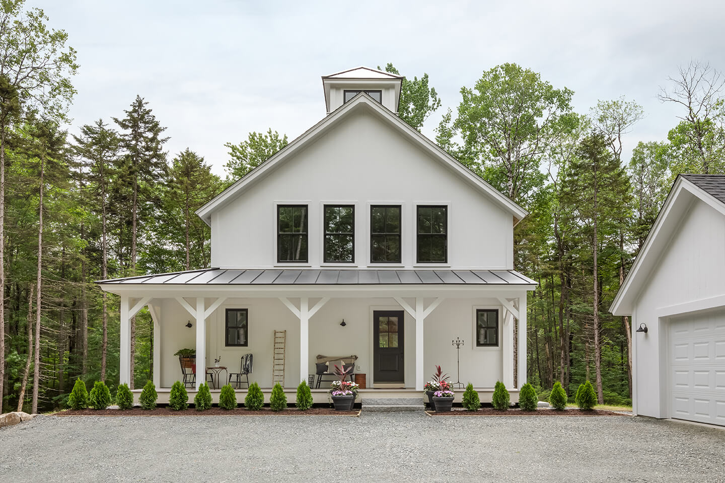 Exterior of Cottage farmhouse-style home in New Hampshire.