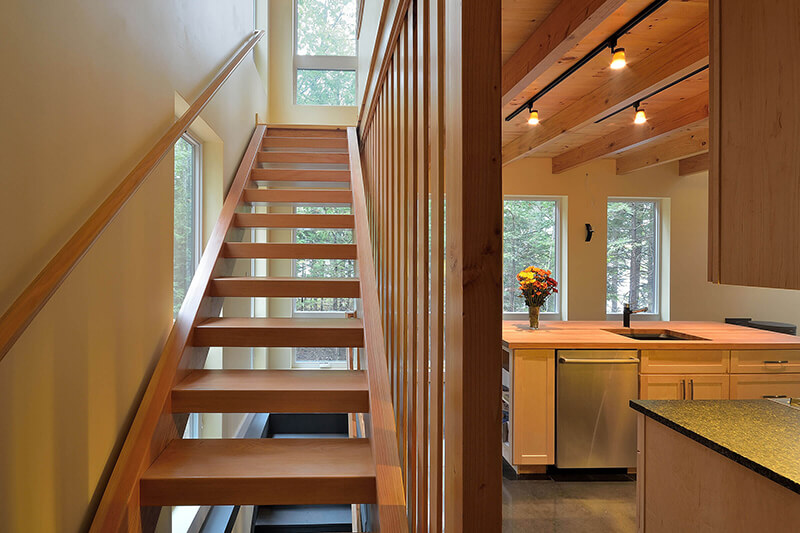 Staircase And Kitchen In Contemporary Cabin With Marvin Essential Windows