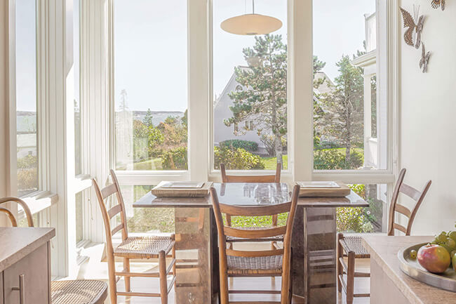 Sunny Dining Area With Elevate Windows