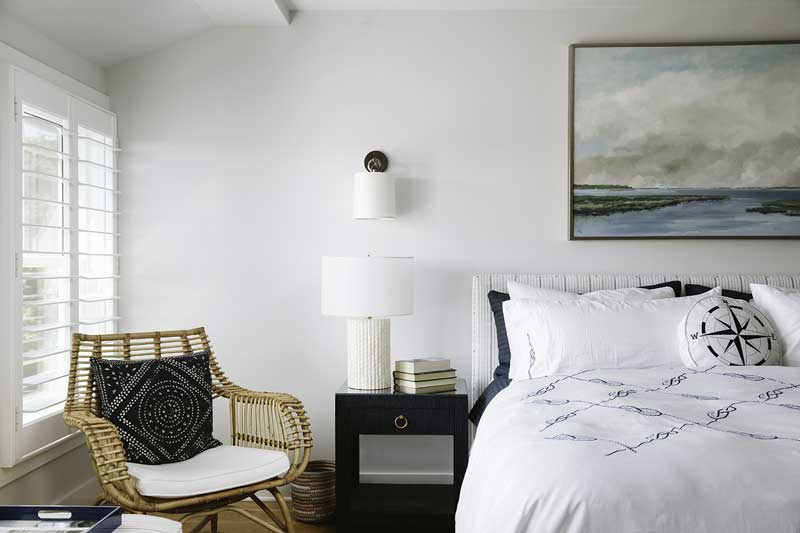 A nautical bedroom in a condo at The Standard featuring Marvin Ultimate Double Hung G2 windows.