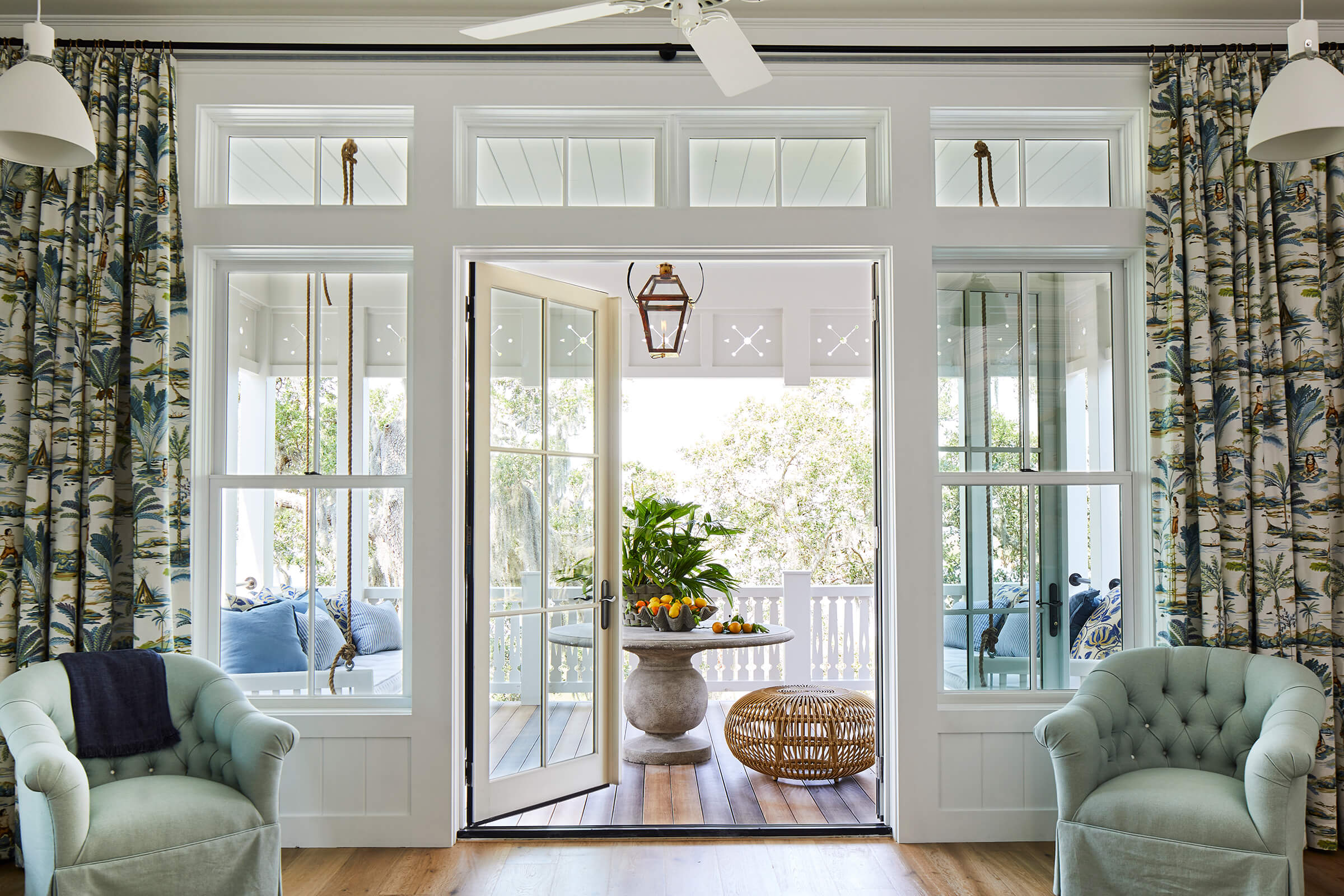 Inside 2019 Southern Living Showhouse looking out to the porch through Marvin French doors.