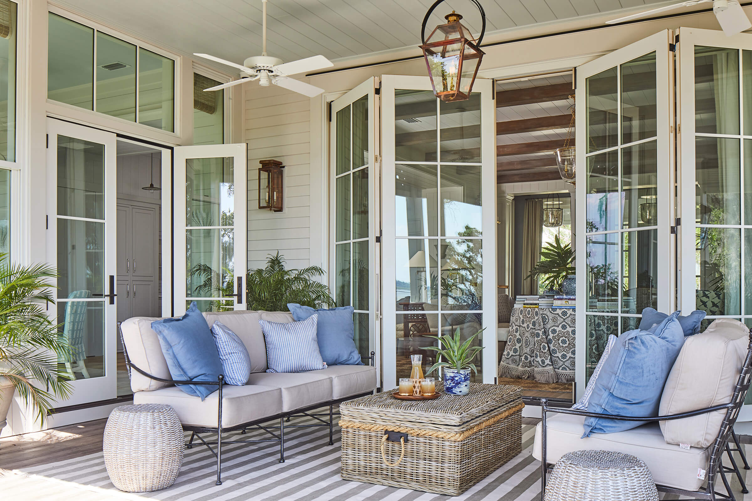 A porch of the 2019 Southern Living Showhouse featuring a Marvin bi-fold patio door.