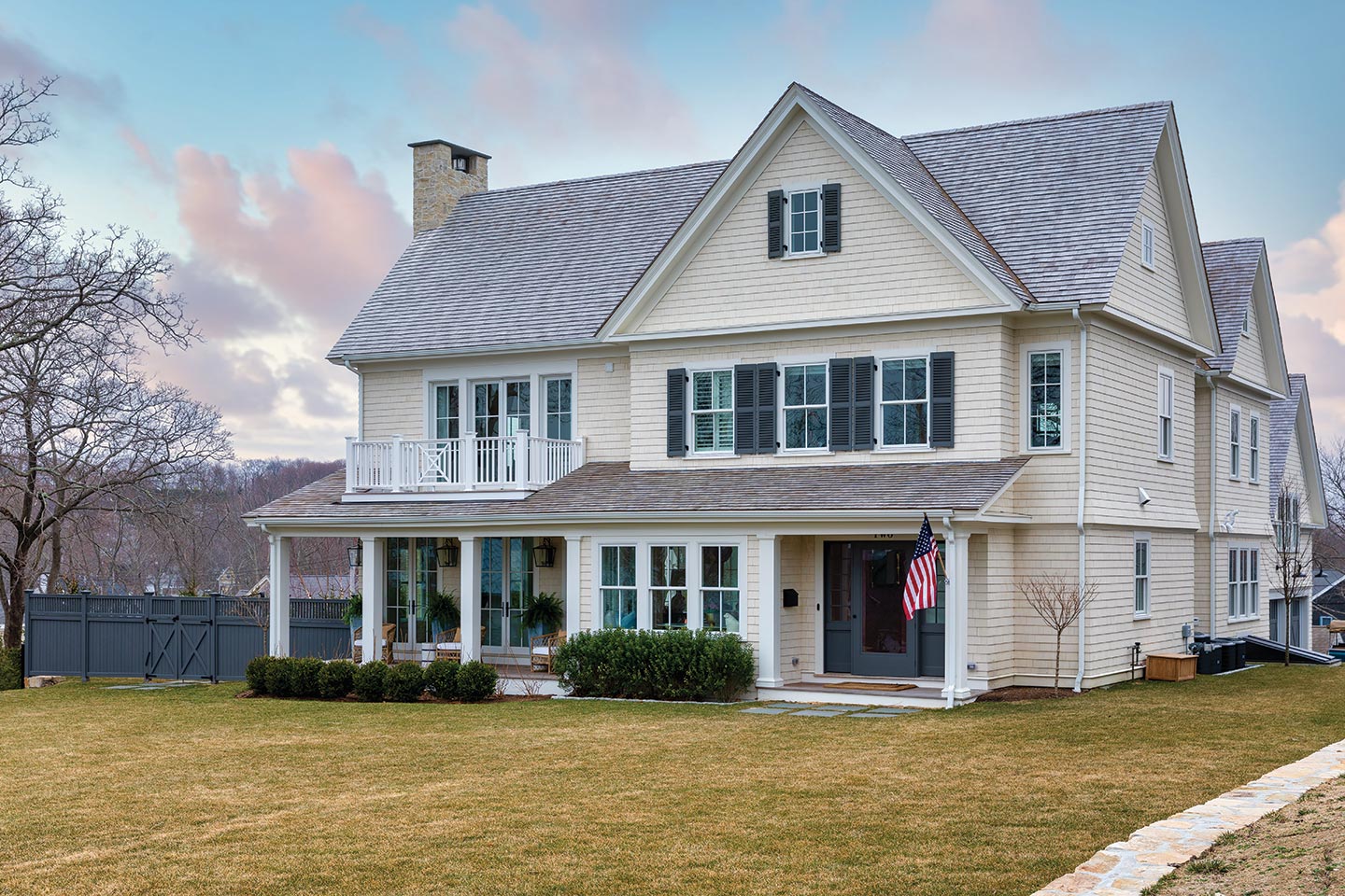 A traditional home overlooking Hingham Harbor, featuring Marvin Elevate windows and doors