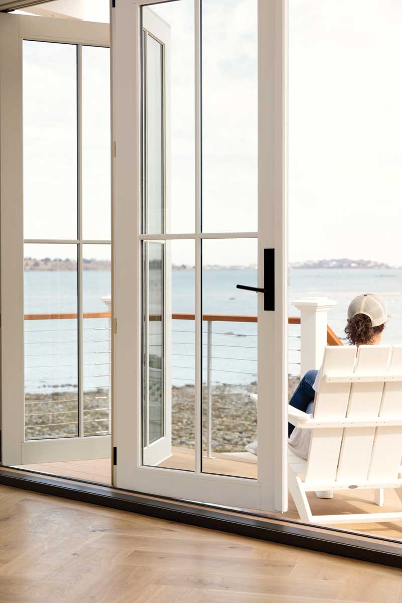 The view through a Marvin Elevate Bi-Fold door to Kimball Beach.