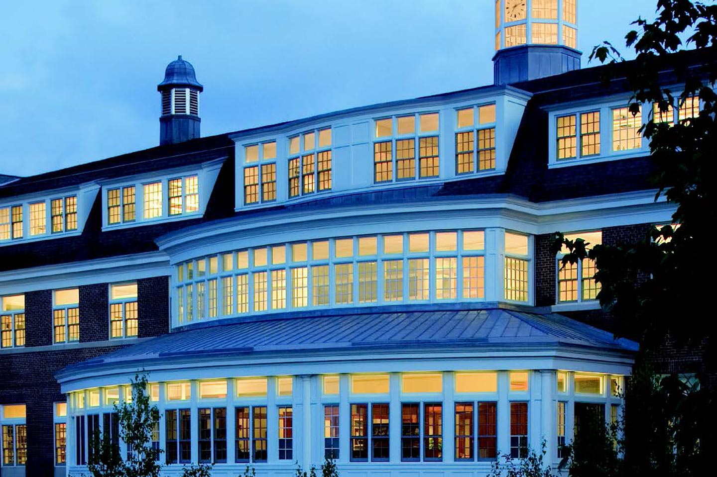 An exterior photo of The Salisbury School's Centennial Humanities Building featuring Marvin Ultimate windows. 