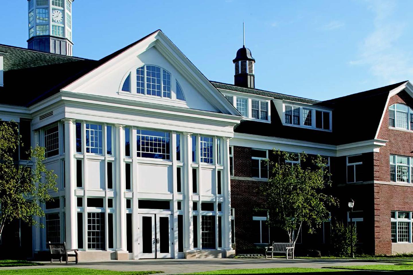 An exterior photo of The Salisbury School's Centennial Humanities Building featuring Marvin Ultimate windows. 