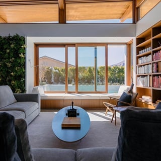 Indoor/outdoor living platform in the Axiom Desert House by Turkel Design.