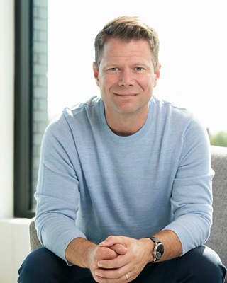 Headshot of Paul Marvin, CEO and Chair of the Board