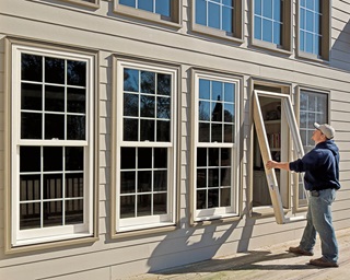 Man Installing A Marvin Window