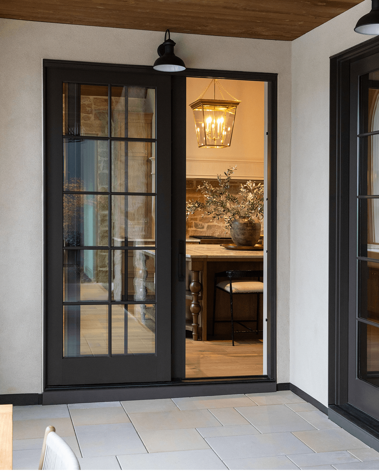 Exterior view of a two-panel dark Marvin Ultimate Sliding Door.