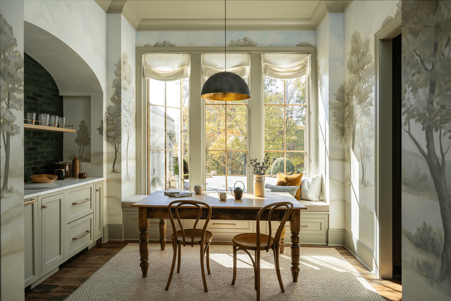 The dining room area of a home with Marvin Elevate casement windows.