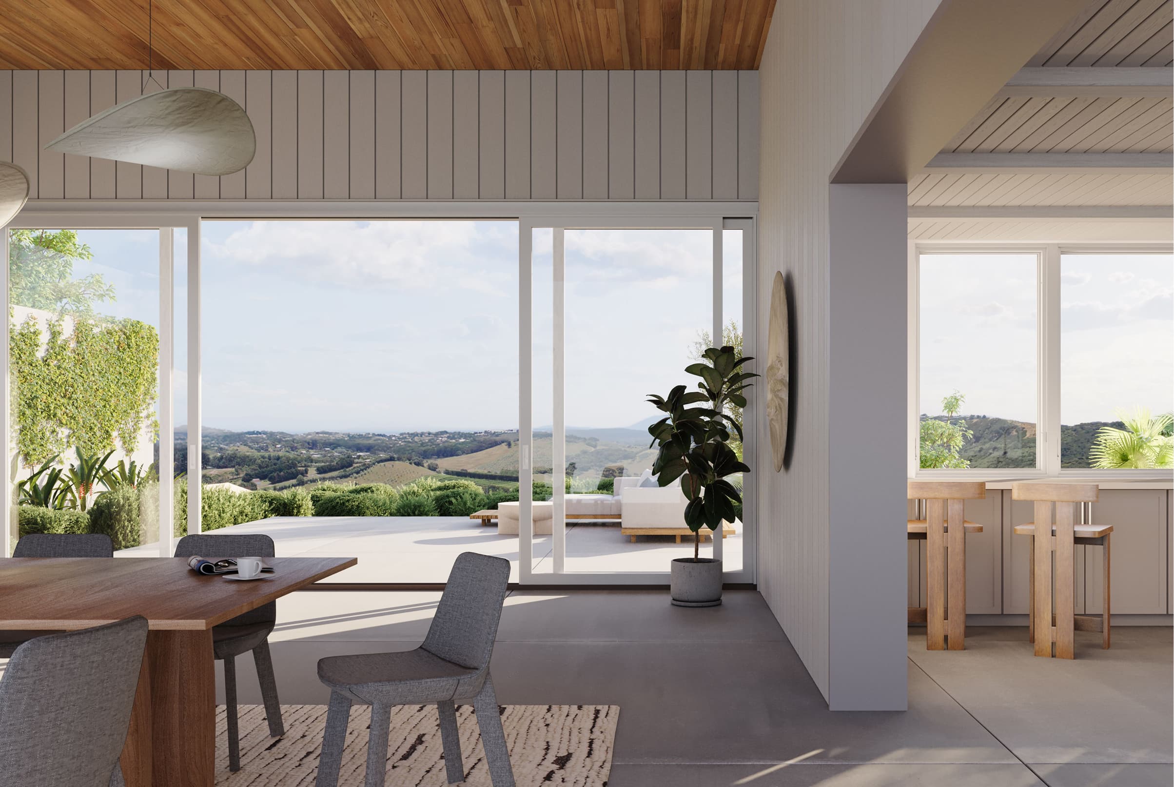 White home interior showcasing an opened white Marvin Modern Sliding door leading to a valley view.